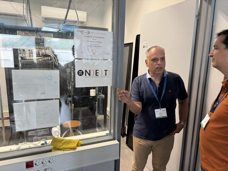 Christos showing where the magic happens, gated by an ETSI Certificate of Participation